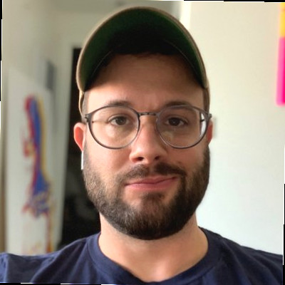 Headshot of Aaron Tate.
