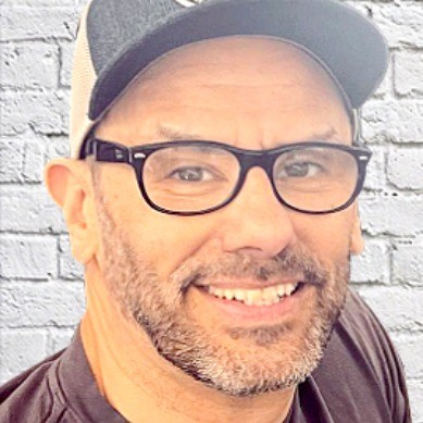 Headshot of Justin Marine.